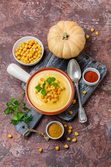 Homemade spicy cream soup of chickpeas and pumpkin.
