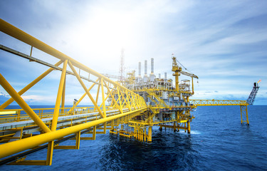 Offshore oil and gas rig platform with beautiful sky in the gulf of Thailand.