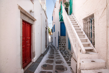 Narrow street in town centre of Mykonos, Greece.