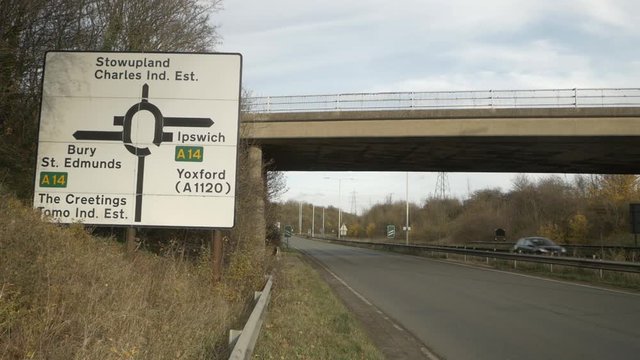A14 Road sign with passing cars