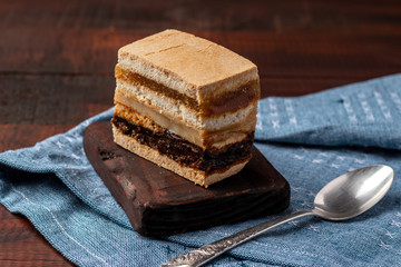 Delicious peruvian dessert called King Kong with dulce de leche and jam.