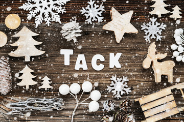 White Letters Building The Word Tack Means Thank You. Wooden Christmas Decoration Like Seld And Tree And Star. Brown Wooden Background With Snowflakes