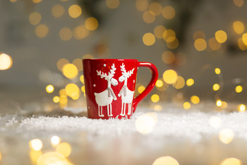 Christmas-themed mug with deer. Cozy warm family atmosphere, festive decor