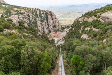 Santa Maria de Montserrat Abbey in Monistrol de Montserrat Monastery view from above located nearby...