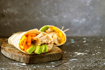 Burrito with grilled chicken and vegetables (fajitas, pita bread, Shawarma)