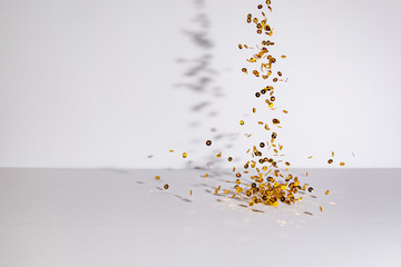 golden sequins with white background
