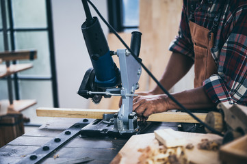 The carpenter is working in the studio, Handmade woodworking