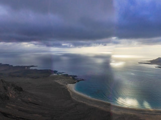 Drone shot, flying over the north of the island of Lanzarote, from the Mirador del Rio and the...