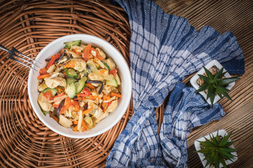 Fried chicken pieces with vegetables.