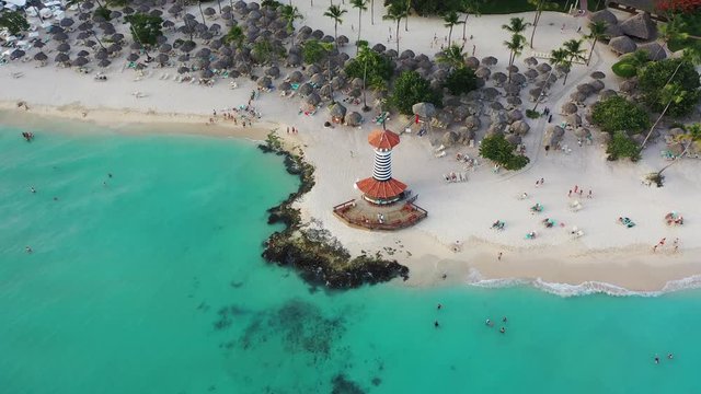Bayahibe beach Lighthouse aerial video by drone. Crystal clear caribbean sea with beautiful beach in Dominican Republic.