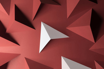 Composition with triangular shapes, red background	