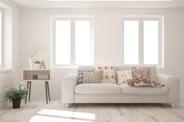 Stylish room in white color with sofa. Scandinavian interior design. 3D illustration