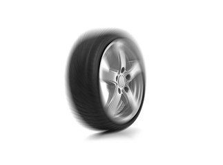 Spinning car wheel isolated on white background.