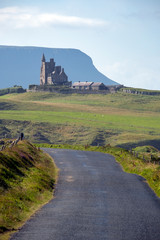Road leading to the Classiebawn Castle in the background. Co. Sligo, Ireland. August 2019
