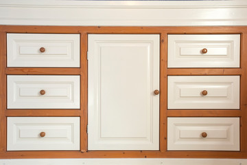 retro wooden closet with drawers closeup, modern interior minimalist style wardrobe