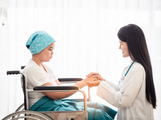 Doctor holding patient's hand together over white background,helping hand and encouragement together with kindess and liberality.