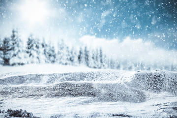 Snowy winter sunshine landscape with wooden board top for products and decorations.