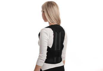 Woman with Posture Corrector. Scoliosis, Kyphosis treatment