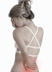 Naklejka premium Woman suffering from back and neck pain. Muscle spasm, .Chiropractic concept. Sport exercising injury