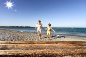 Family walking and having fun on the beach.