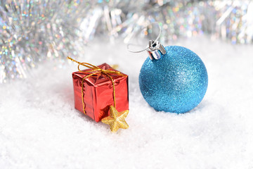 Christmas turquoise balls in the snow, Christmas gifts