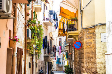 Fototapeta na wymiar Colorful and old alleys of the touristic Italian city of Bari.