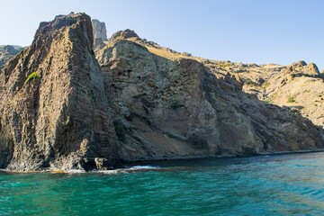 Fototapeta na wymiar Kara-Dag mountains, view of the rocks from the sea, Crimea, Russia.