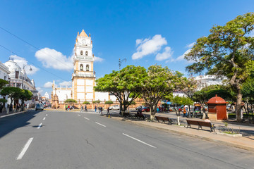 Fototapeta na wymiar Sucre Bolivia cathedral tower in 25th May square in a sunny day