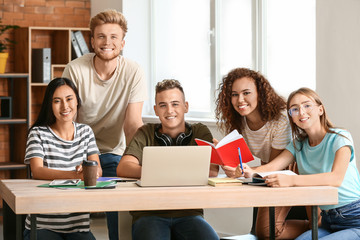 Group of students preparing for exam in university