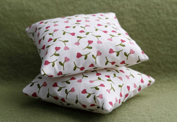Lovely pillows with heart shaped flower pattern
