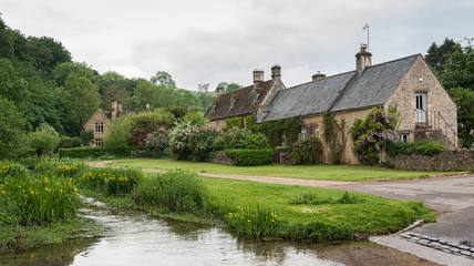 UPPER SLAUGHTER, COTSWOLDS, GLOUCESTERSHIRE, ENGLAND - MAY, 27 2018: Charming corners of the beautiful and pretty village of Upper Slaughter in the Cotswolds region - Gloucestershire, Cotswolds, UK