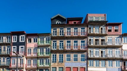 Fototapeta na wymiar Colorful buildings in the Old Porto neighborhood of Ribeira.