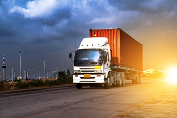 Industry 4.0 Truck transportation,Container cargo working for import export logistic industrial with beautiful sky background,Thailand