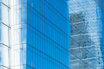 Street view over glass building facade with lines and windows. Graphic pattern architecture, urban concept, Manhattan, New York., USA