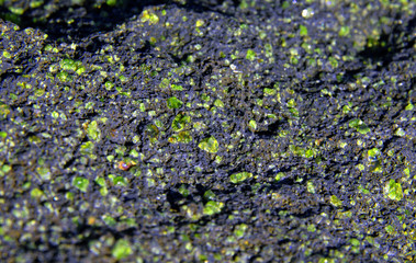 Green Olivine Embedded in Cliffs on Big Island