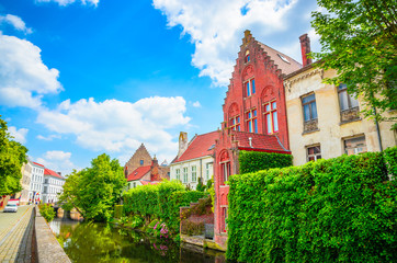 Beautiful canal and traditional houses in the old town of Bruges (Brugge), Belgium