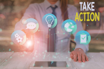 Conceptual hand writing showing Take Action. Concept meaning to do somethingoract in order to get a...