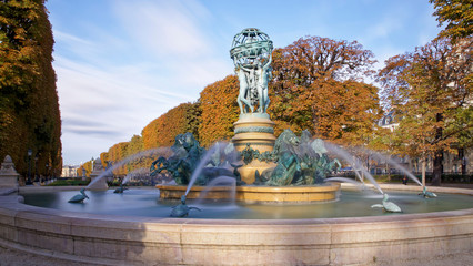 Paris, France - October 12, 2019: The Fontaine de l'Observatoire is a monumental fountain located in the Jardin Marco Polo, south of the Jardin du Luxembourg in the 6th arrondissement of Paris