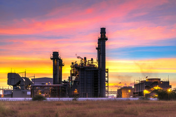Fototapeta na wymiar Sunlight Petrochemical industrial plant power station at sunset and Twilight sky view,Amata City Industrial Thailand