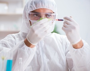 Biotechnology scientist chemist working in lab