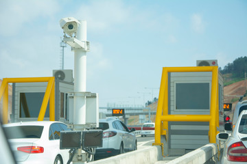 Camera in front of highway booth