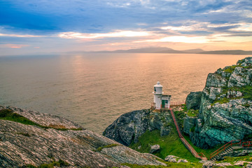Mizen Head Sheep's Head Peninsula West Cork Ireland lighthouse cliffs rocks  landmark sunset wild...