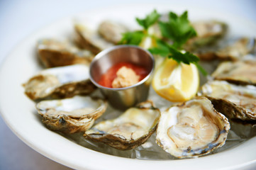 raw oysters with red sauce