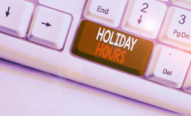 Text sign showing Holiday Hours. Business photo showcasing employee receives twice their normal pay...