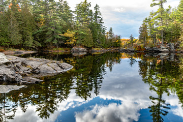 Crown Land access to untouched beauty with calm water reflections