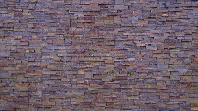 Water Running down Bricks Wall