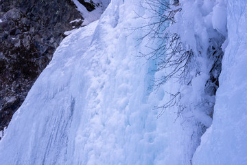 Fototapeta na wymiar Amazing view of frozen waterfall