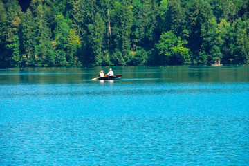 Fototapeta na wymiar Man and wife enjoying the lake Bled 