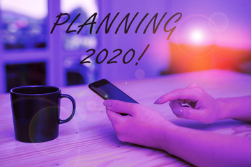 Conceptual hand writing showing Planning 2020. Concept meaning process of making plans for...