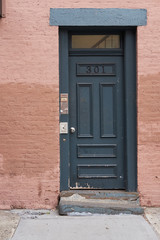 Door on brick wall